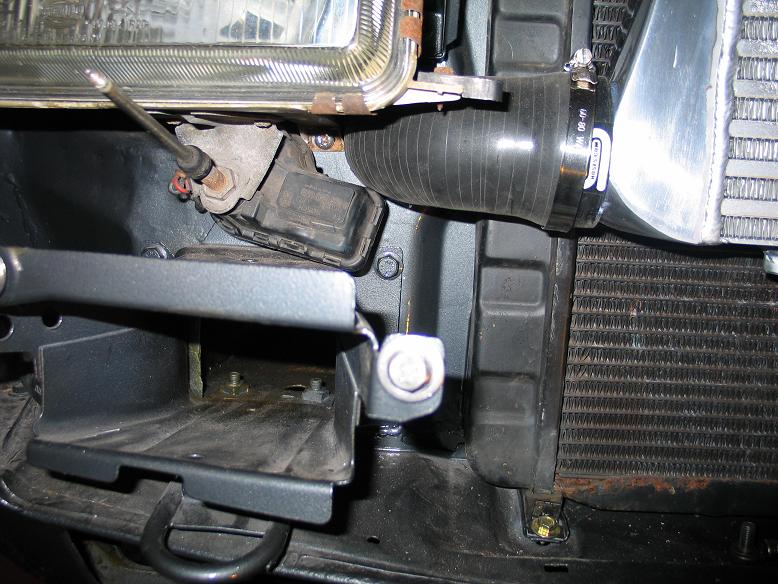Headlight wiper motor just fits after cutting away a little plastic on the light body
