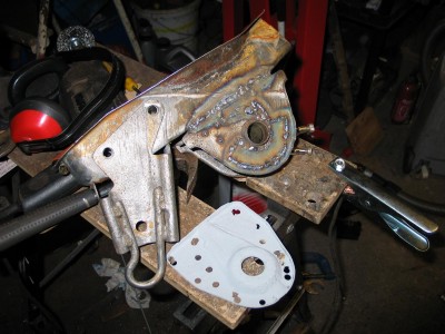 Partly repaired rear spring mount